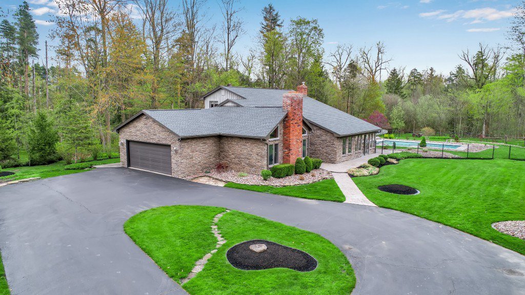 Drone aerial photo of a home with circular driveway