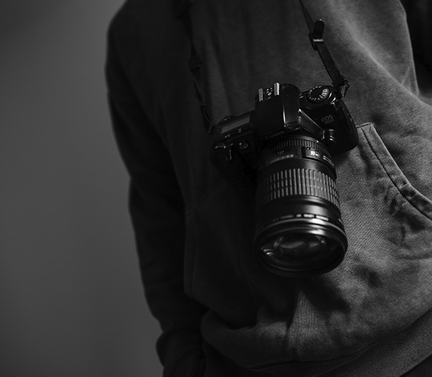 Videographer holding a camera